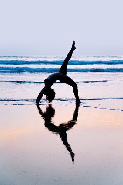 Young woman practicing yoga - Zdjęcie, obraz