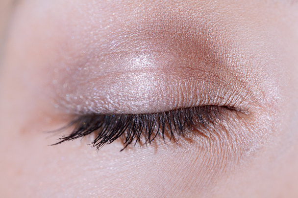 Beautiful woman's brown eye close up - Foto, imagen