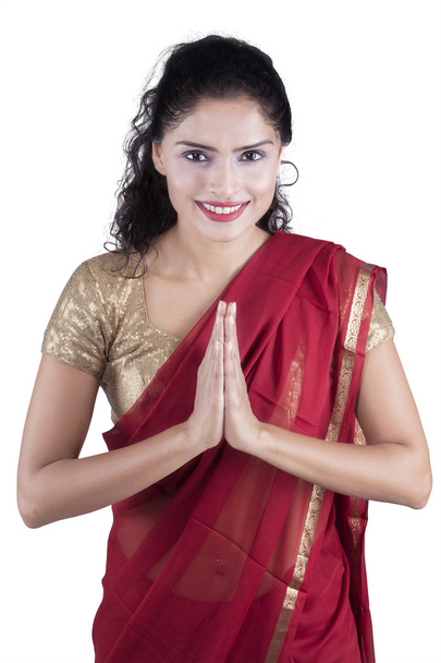 Indian woman with greeting gesture - Фото, изображение