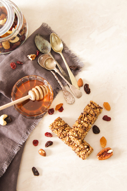 bar of delicious muesli with honey and nuts - Fotografie, Obrázek