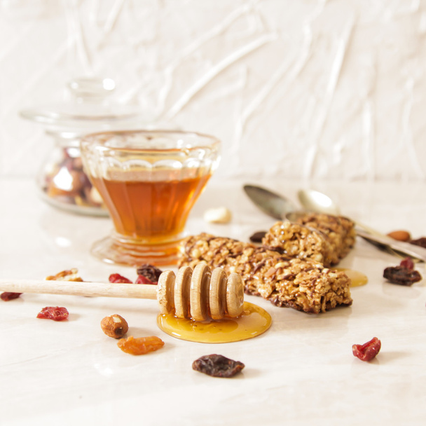 bar of delicious muesli with honey and nuts - Фото, изображение