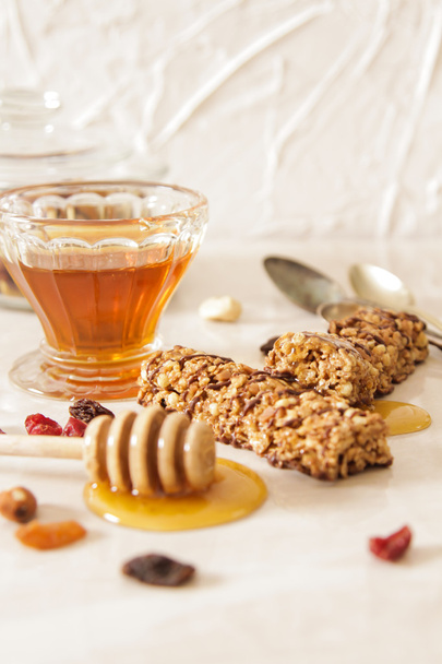 bar of delicious muesli with honey and nuts - Foto, imagen