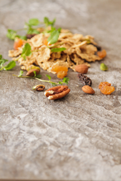 muesli with nuts and dried fruits mint leaves - Фото, зображення
