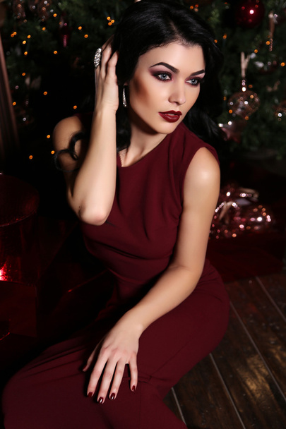 beautiful sensual woman with dark hair wears elegant dress  - Fotografie, Obrázek