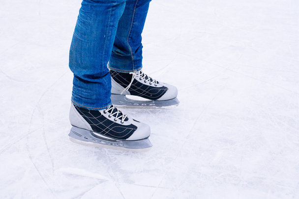 Man ice skating. winter outdoors on ice rink.  - Zdjęcie, obraz