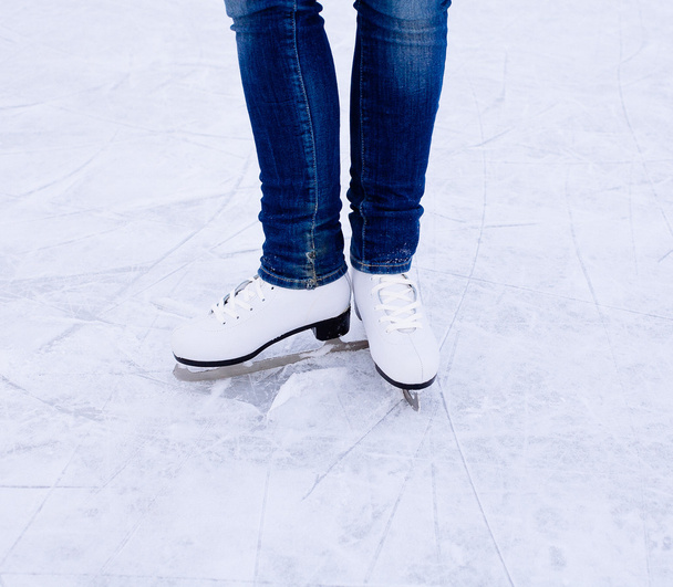 Woman ice skating. winter outdoors on ice rink. - Valokuva, kuva