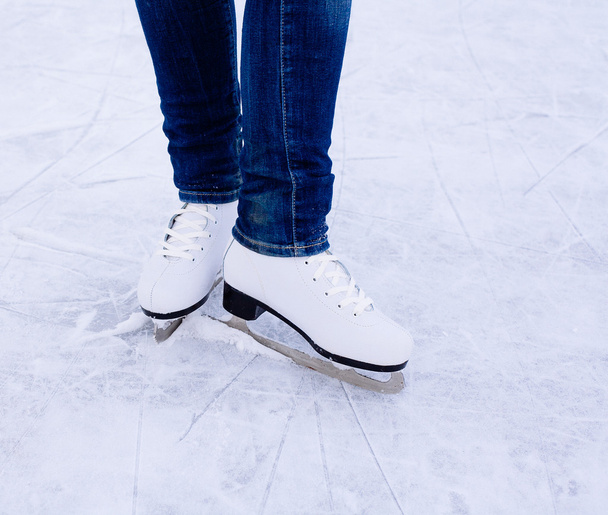 Woman ice skating. winter outdoors on ice rink. - Foto, Imagem