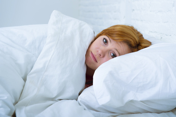 young woman  lying in bed sick unable to sleep suffering depress - Φωτογραφία, εικόνα
