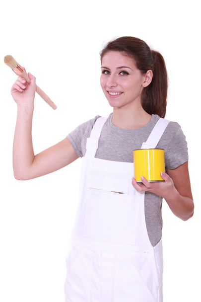 Woman holding paint tin and brush - Foto, Imagen