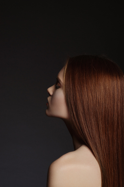 sensual glamour portrait of beautiful red-haired girl - 写真・画像