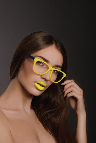 Beauty woman face portrait with yellow lips - Фото, зображення