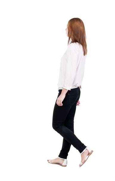 walking  woman in jeans - Zdjęcie, obraz