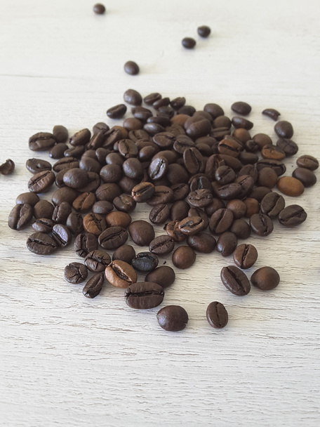 Coffee beans on a table - Foto, Imagen