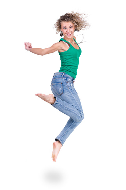young dancer woman jumping against white background - Foto, Imagem