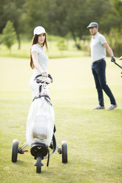 Couple at golf court - Photo, Image