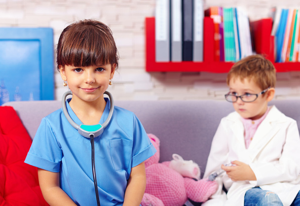 cute kids playing doctors with toys - Foto, immagini