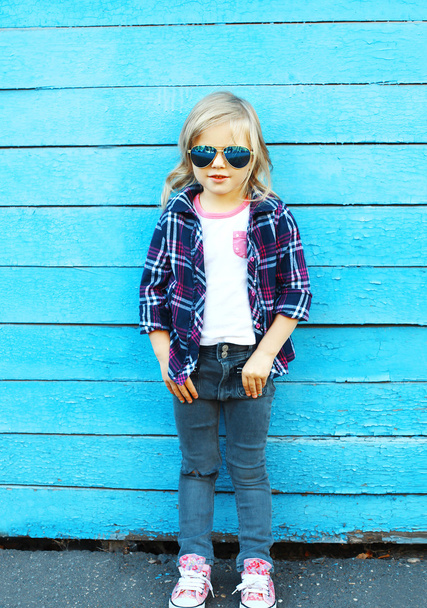 Fashion kid, stylish child wearing a sunglasses and checkered sh - Фото, зображення