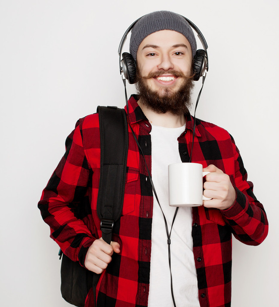 young bearded man with a cup of coffee - 写真・画像