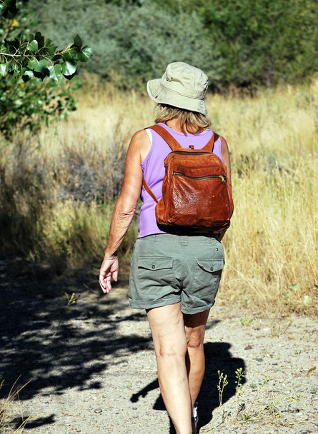 Female backpacker. - Фото, изображение