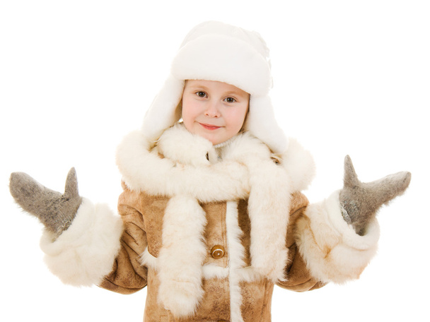 The girl in warm clothes shows his hands on a white background. - Foto, imagen