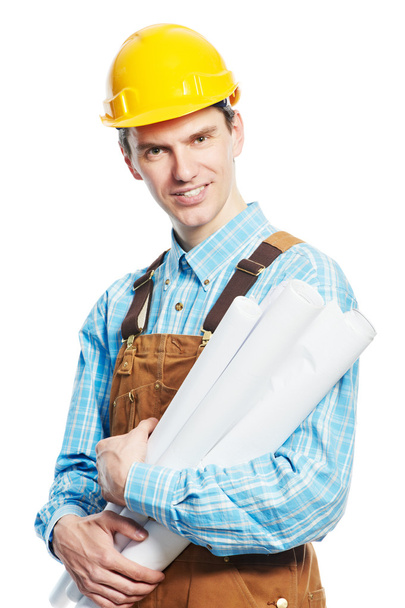 Happy worker in hardhat and overall with drafts - Foto, Imagem