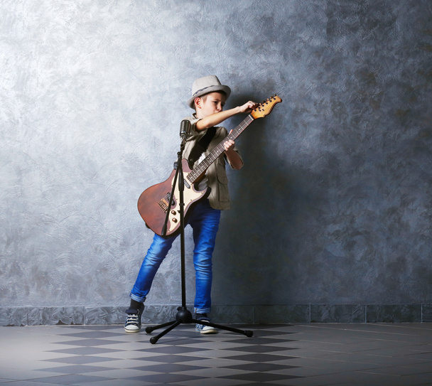 boy playing guitar  - Фото, изображение