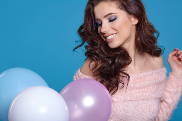 brunette woman with balloons - 写真・画像