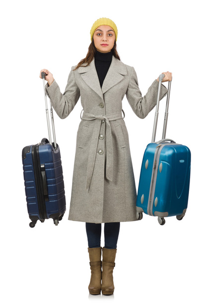 Woman with suitcase ready for winter vacation - Фото, зображення