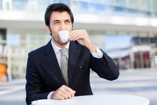 businessman drinking a coffee - Фото, зображення