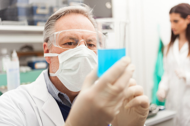 Scientist holding a test tube - Foto, Bild