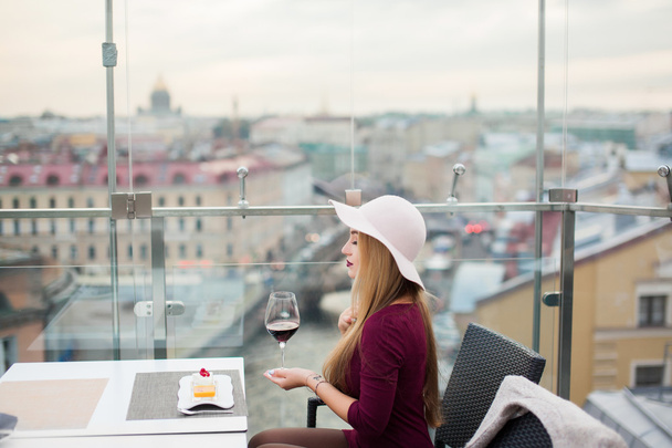 young woman drinking red wine - Φωτογραφία, εικόνα