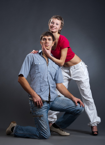 Young couple posing in studio - Photo, Image