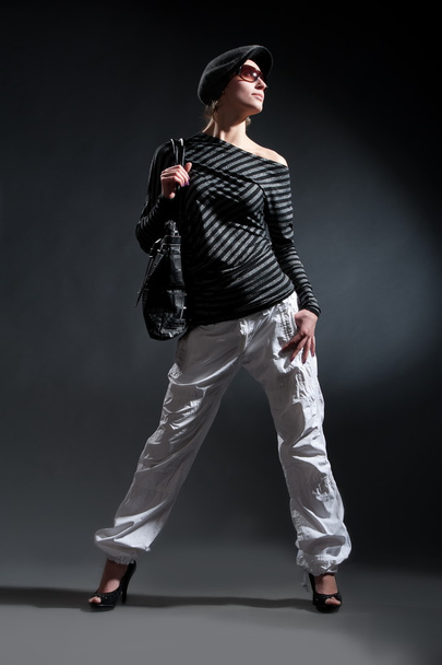 Woman with short hair posing with bag - Zdjęcie, obraz