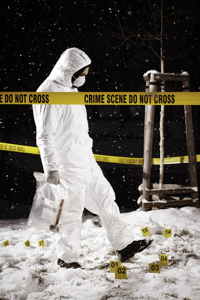 Leaving crime scene with evidences - Foto, afbeelding