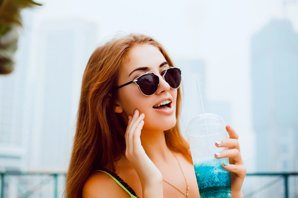 young woman   drinking cocktail - Photo, Image
