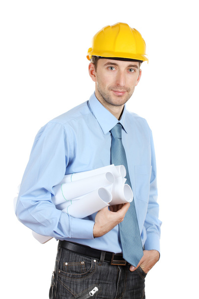 Young man architect with helmet and drafts isolated on white - Фото, зображення
