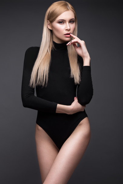 sexy  fashion model with long hair, young European attractive, beautiful eyes, full lips, perfect skin is posing in studio for glamour vogue test photo shoot showing different poses - Φωτογραφία, εικόνα