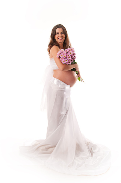 The image of a pregnant woman with violet flowers isolated on wh - Φωτογραφία, εικόνα