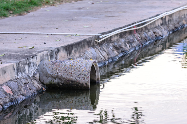 Cement waterspout for waste water out from factory. - Photo, Image