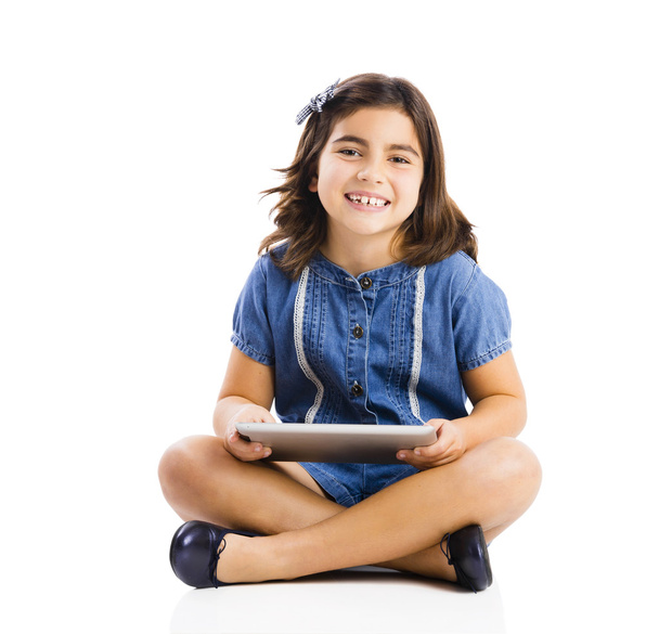 Young girl using a tablet - Foto, Bild