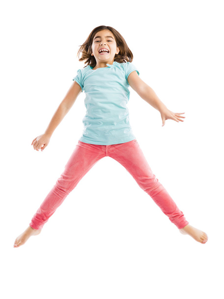 Happy young girl jumping - Foto, immagini
