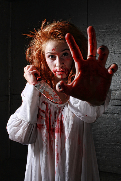 Horror Themed Image With Bleeding Freightened Woman - Photo, Image