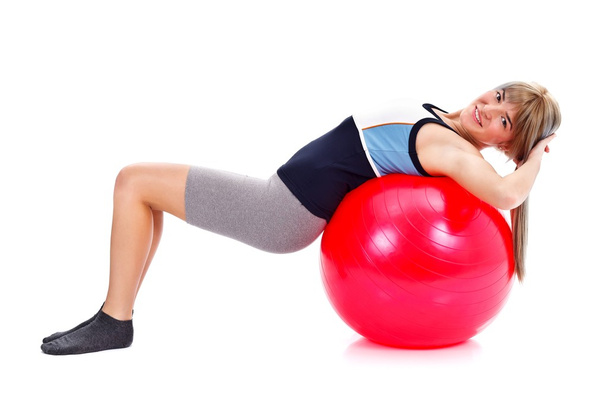 Stretching on pilates ball - Zdjęcie, obraz