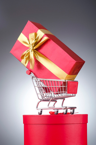 Christmas shopping concept with shopping cart - Foto, afbeelding
