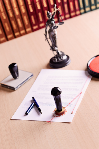 The document waiting for the signature of a notary.  - Photo, Image