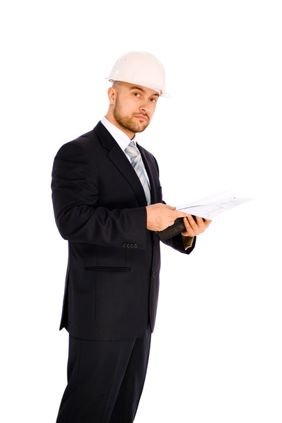 Ingenieur im Helm auf weißem Hintergrund - Foto, Bild