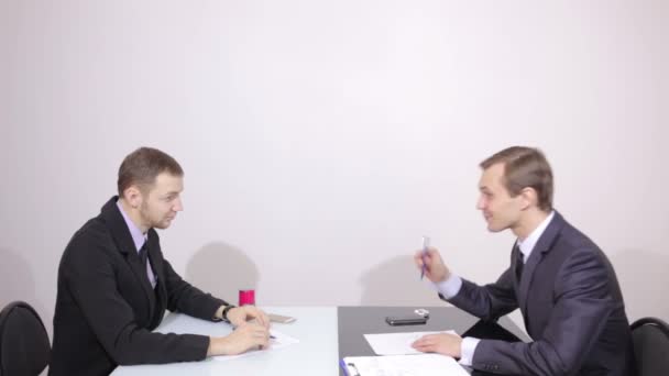 businessman makes a proposal and the partner was refused. two men at the table - Footage, Video