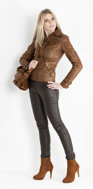 Standing woman wearing brown clothes and fashionable brown shoes - Foto, Imagem