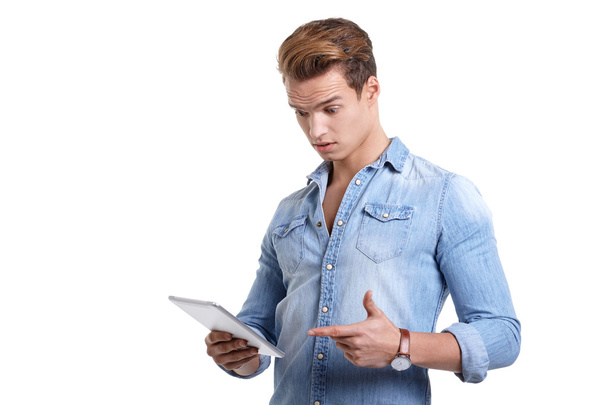 Young man with tablet - Photo, Image