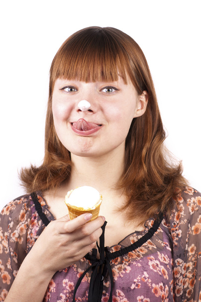 Portrait of funny expression girl eating ice-cream isolated - Fotografie, Obrázek
